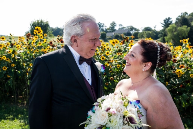 Wedding couple with sunflowers