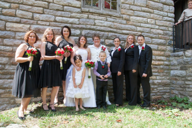 Wedding Party with stone wall